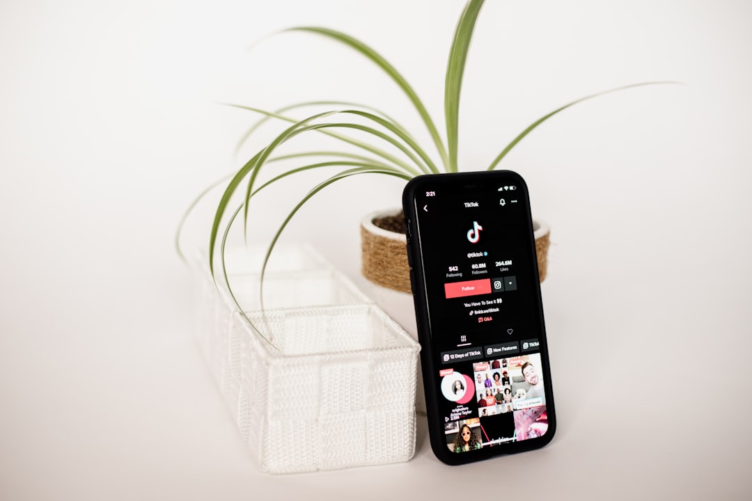 Person scrolling TikTok and Instagram on phone in niche feed